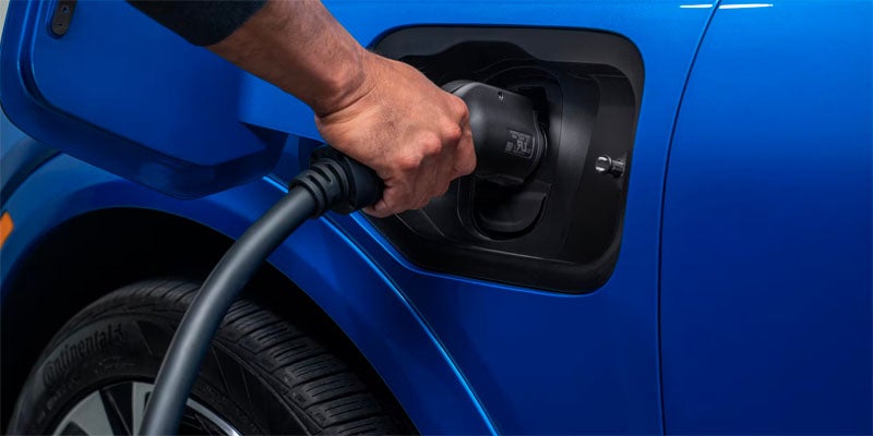 James Wood Buick GMC in Decatur TX close up of a charging handle in a vehicle